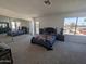 Spacious bedroom with large mirror closet doors and views of the neighborhood at 4636 E Carmen St, Phoenix, AZ 85044