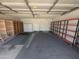 Spacious garage with storage cabinets and shelving units for ample storage space at 4636 E Carmen St, Phoenix, AZ 85044