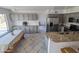 Well-lit kitchen features granite countertops, stainless steel appliances, and grey cabinets at 4636 E Carmen St, Phoenix, AZ 85044