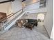 Inviting living room showcasing an open staircase, tile floors, and comfortable seating at 4636 E Carmen St, Phoenix, AZ 85044
