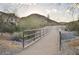 Scenic concrete walkway with bridge, mountains, and desert landscape views at 4636 E Carmen St, Phoenix, AZ 85044