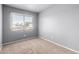 Cozy bedroom with neutral carpet and a bright window at 5201 N 42Nd N Pkwy, Phoenix, AZ 85019