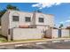 Exterior highlighting well-kept stucco and assigned parking spaces, enhancing the community's aesthetic appeal at 5201 N 42Nd N Pkwy, Phoenix, AZ 85019