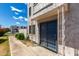 Street view of front entrance showing secure gate and awning, ensuring safety and providing a shaded welcome at 5201 N 42Nd N Pkwy, Phoenix, AZ 85019