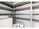 A laundry room featuring built-in shelving at 5201 N 42Nd N Pkwy, Phoenix, AZ 85019