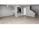 Open-concept living area features tiled floors connecting to stairs and kitchen at 5201 N 42Nd N Pkwy, Phoenix, AZ 85019