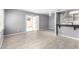 Bright, open-concept living area featuring tile floors and access to the backyard at 5201 N 42Nd N Pkwy, Phoenix, AZ 85019