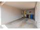 Practical carport providing sheltered parking with a white brick wall, plus some trash receptacles at 524 W Fairway Dr # 9, Mesa, AZ 85201