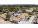 Expansive aerial view of the property showcasing the pool, manicured backyard, and landscaping at 5430 E Shea Blvd, Scottsdale, AZ 85254