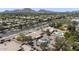 Aerial view displays the property, pool, landscaping, neighborhood, and mountain backdrop at 5430 E Shea Blvd, Scottsdale, AZ 85254