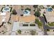 Bird's-eye view of a stunning home, showcasing its meticulously landscaped grounds, sparkling pool, and elegant design at 5430 E Shea Blvd, Scottsdale, AZ 85254