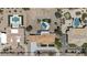 Aerial shot showcasing the community, landscaping, desert terrain, and pools at 5430 E Shea Blvd, Scottsdale, AZ 85254