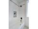 Stylish bathroom shower featuring modern tile, a rainfall showerhead, and a built-in niche at 5430 E Shea Blvd, Scottsdale, AZ 85254