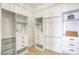 Walk-in closet with built-in shelving and ample storage space for an organized wardrobe at 5430 E Shea Blvd, Scottsdale, AZ 85254