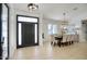Inviting entryway features modern lighting, a spacious dining area and neutral decor throughout at 5430 E Shea Blvd, Scottsdale, AZ 85254