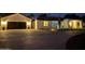 Stunning desert home with a circular drive and a detached garage offers ample parking at 5430 E Shea Blvd, Scottsdale, AZ 85254