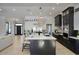 A modern kitchen features a large center island and stainless steel appliances at 5430 E Shea Blvd, Scottsdale, AZ 85254