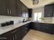 Sleek kitchen featuring modern cabinets, quartz countertops, and stainless steel appliances at 5430 E Shea Blvd, Scottsdale, AZ 85254