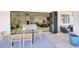 Stunning indoor/outdoor living with a dining area that transitions seamlessly into a beautifully decorated interior at 5430 E Shea Blvd, Scottsdale, AZ 85254