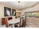 Dining room with a wooden table and chairs with an open view into the Gathering room at 5512 E Barwick Dr, Cave Creek, AZ 85331