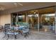 Covered patio with a dining table and chairs, leading to the main living area at 5512 E Barwick Dr, Cave Creek, AZ 85331