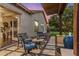 Cozy outdoor patio with comfortable seating and a garden view at 5512 E Barwick Dr, Cave Creek, AZ 85331