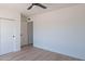 Bright bedroom with light wood floors, and white trim at 5534 W Calavar Rd, Glendale, AZ 85306