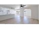 Open living area with modern flooring seamlessly connecting to the kitchen at 5534 W Calavar Rd, Glendale, AZ 85306