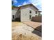 Backyard featuring privacy wall and brick paving, creating a secluded and inviting outdoor space at 5952 W Morning Dove Dr, Glendale, AZ 85308