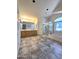 Spacious bathroom with a soaking tub, glass-enclosed shower, and a double vanity at 5952 W Morning Dove Dr, Glendale, AZ 85308