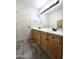 Bathroom with double sink vanity, and tile flooring at 5952 W Morning Dove Dr, Glendale, AZ 85308