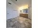 Bright bathroom with a double sink vanity, tile flooring, and ample space at 5952 W Morning Dove Dr, Glendale, AZ 85308