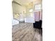 Welcoming entryway features hardwood floors and plenty of natural light at 5952 W Morning Dove Dr, Glendale, AZ 85308