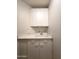 Bright laundry room with white cabinets and sink at 5952 W Morning Dove Dr, Glendale, AZ 85308