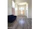 Bright, open living room with hardwood floors and plenty of light at 5952 W Morning Dove Dr, Glendale, AZ 85308