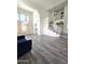 Spacious living room features high ceilings and wood floors at 5952 W Morning Dove Dr, Glendale, AZ 85308