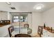Cozy breakfast nook bathed in light with backyard views perfect for casual dining at 6 E Piping Rock Rd, Phoenix, AZ 85022