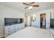 Bright bedroom offering lots of space, ensuite bathroom, walk-in closet, and ceiling fan at 623 W Guadalupe Rd # 213, Mesa, AZ 85210