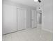 Bedroom features sliding closet doors and recessed lighting at 6332 W Sunnyslope Ln, Glendale, AZ 85302