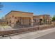Charming home featuring beautiful stonework, a gated yard, and a covered parking area at 6459 W Columbus Ave, Phoenix, AZ 85033