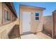 This backyard outbuilding has a window and door and is newly renovated at 6459 W Columbus Ave, Phoenix, AZ 85033