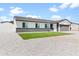 Inviting one-story home featuring a manicured lawn and a stone driveway at 6908 W Sierra St, Peoria, AZ 85345
