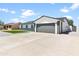 Well-kept one-story home with a two-car garage and neat landscaping on a sunny day at 6908 W Sierra St, Peoria, AZ 85345