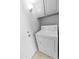 Bright laundry area with a dryer, upper cabinets, and access to the exterior at 6908 W Sierra St, Peoria, AZ 85345