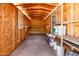 Well lit storage shed interior with shelves for storing all of your tools and equipment at 6908 W Sierra St, Peoria, AZ 85345