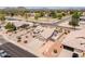 Aerial shot highlighting a desert home's well-maintained landscape, offering a tranquil living environment at 6988 W Monte Lindo --, Glendale, AZ 85310