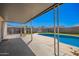Inviting backyard oasis featuring a refreshing pool and covered patio for outdoor relaxation and enjoyment at 7011 W Carol Ann Way, Peoria, AZ 85382
