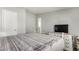 Bright bedroom with a neutral color scheme, carpeted floors, and great natural light at 7011 W Carol Ann Way, Peoria, AZ 85382