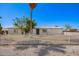Inviting single-story home with a secure white picket fence and desert landscaping for low maintenance at 7011 W Carol Ann Way, Peoria, AZ 85382