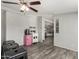 View of an entertainment area leading to a living space, including a pink mini refrigerator at 7011 W Carol Ann Way, Peoria, AZ 85382